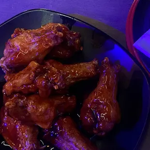 a plate of chicken wings