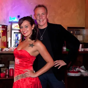 a man and a woman posing for a picture