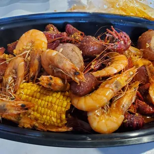 1 lb shrimp, 2 lbs crawfish, potato, corn, sausages
