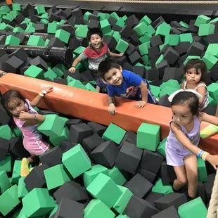 Some of our sweet Junior Jumpers having fun in the foam pit.
