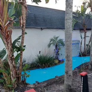 Outdoor patio and pond with fountain