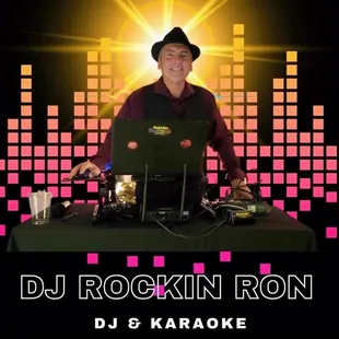 dj in front of a sound board