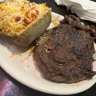 Ribeye with loaded baked potato