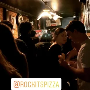 a group of people in a restaurant