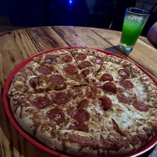 Large pepperoni pizza with thick, soft crust. It's the best pizza I've had in many years.