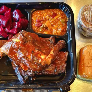 Chicken and Rib Platter with beets, chili, a cup of original sauce, and potato roll.