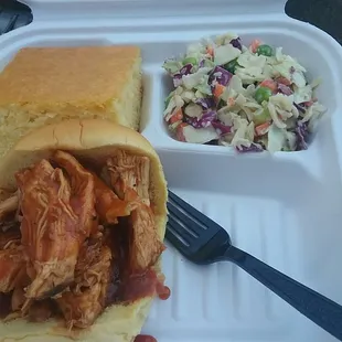 Pulled chicken with  coleslaw and cornbread.