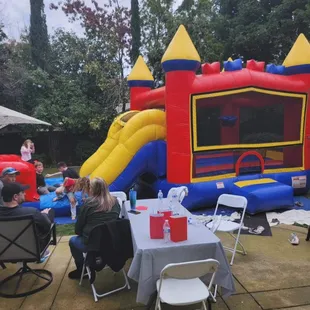 Bouncy castle with slide and basketball hoop!