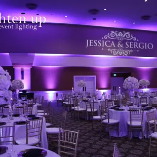 Beautiful wedding at Rocklin Event Center w/ purple uplighting+ monogram by Brighten Up Event Lighting www.brightenuplighting.com