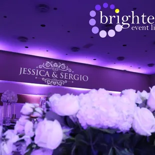 Stunning wedding at Rocklin Event Center w/ purple uplighting+ monogram by Brighten Up Event Lighting www.brightenuplighting.com