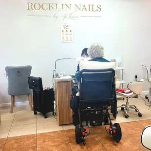 Here is my friend, Jenita, getting her acrylic fill. She also said the pedicure was amazing!