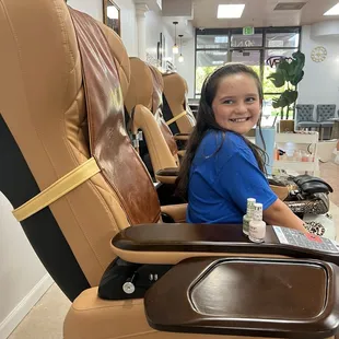 Loving her pedicure.