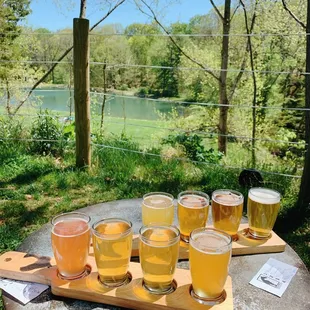 a flight of beers on a table