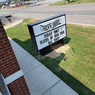 a sign on the side of a building