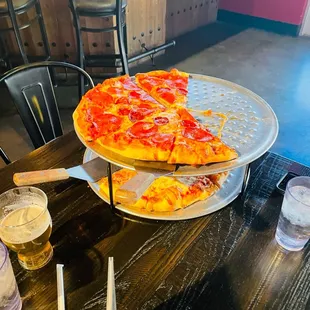 a slice of pizza on a serving platter