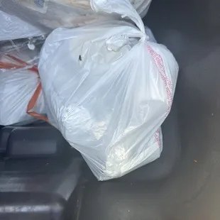 bag of trash in a trash can
