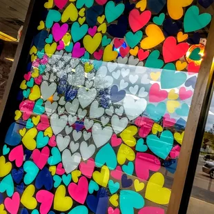 a window display of hearts