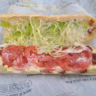 Eggs and bacon sub with lettuce and tomato added.