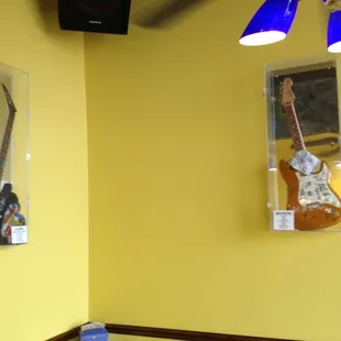 Guitars on the walls from artists like Def Leppard. Rocking place.