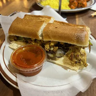 a sandwich with a side of ketchup