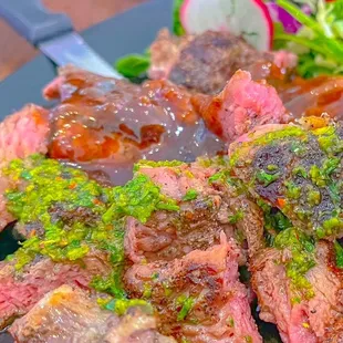 CHURRASCO CRIOLLO: Black angus steak, herb butter and aji panca broth, roasted potatoes, house salad. Sliced per my request.