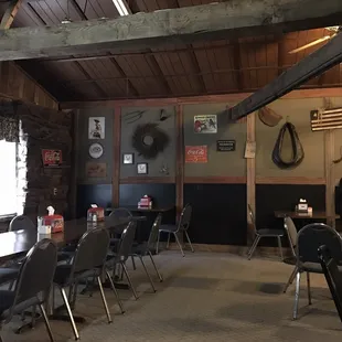 tables and chairs in a rustic setting