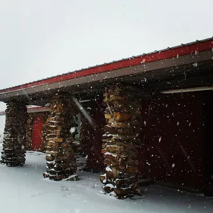 snow falling from the roof
