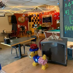 a toaster and a chalkboard with happy birthday written on it