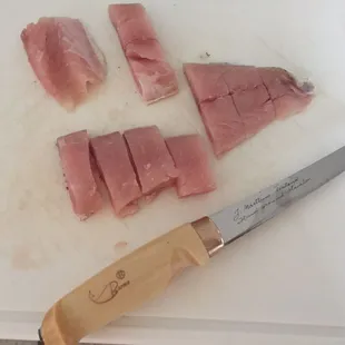 My filet knife from Finland. Rapala.com Has birch wood handle, leather sheathe and knife sharpener.