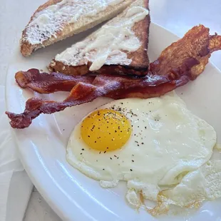 my weekday Rockridge Café routine: toast with butter to dip in the egg two pieces of bacon