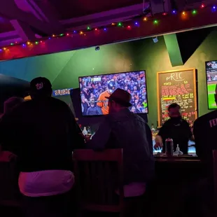 people watching a baseball game