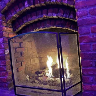 Cozy fireplace perfect for winter drinks!