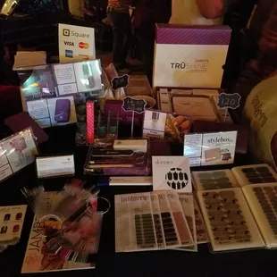 a table full of makeup products
