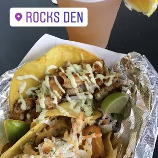 It's called the hook up! And it definitely was! 2 huge seafood packed tacos and a beer