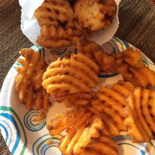 No longer have curly fries. Waffle fries w curly fry seasoning now.