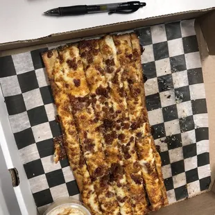 a slice of pizza in a box