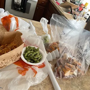 Cajun fries, 2lb seafood in a bag, edamame.