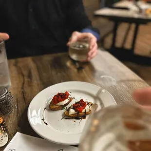 a plate of appetizers on a table