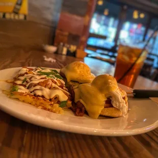 Classic &quot;Eggs Benny&apos;s&quot; with loaded (and refrigerator-cold) inedible hash browns.