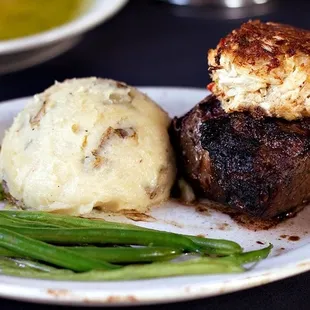 Surf&amp;turf- Delicious cut of tender steak, a rich crab cake, plus it comes with sides unlike other menu items