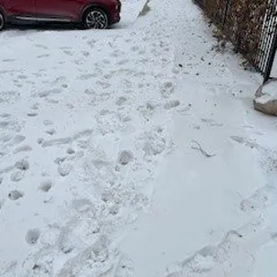This is their sidewalk four days after a snow fall