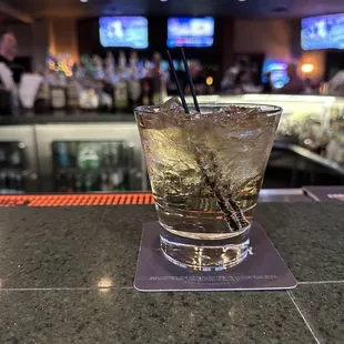 a shot of a drink on the bar