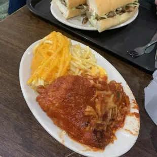 Chicken parm served with Mac n cheese