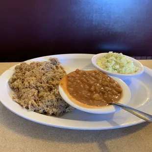 Large pulled pork dinner with baked beans &amp; coleslaw.  I also came with hush puppies