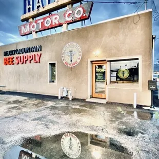 a puddle in front of a building