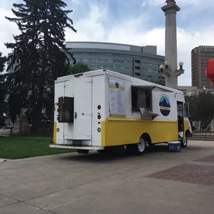 a food truck parked in front of a building