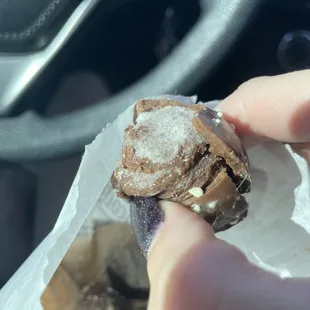 a hand holding a desert