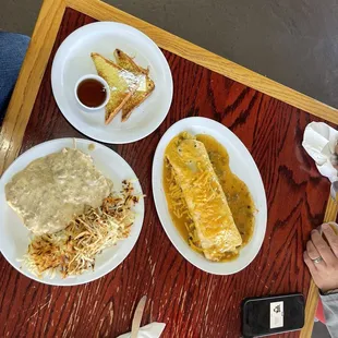 French toast , smothered burrito, and sausage and buicuits