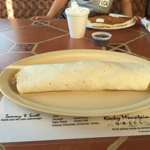 Naked means no green chile sauce on the breakfast burrito, but it's too much for me. I get mine on the side!