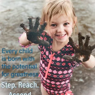 Child playing with mud.